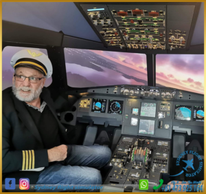 An old man in a pilot’s hat